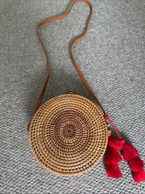Handwoven Round Crossbody Bag with Red Tassels